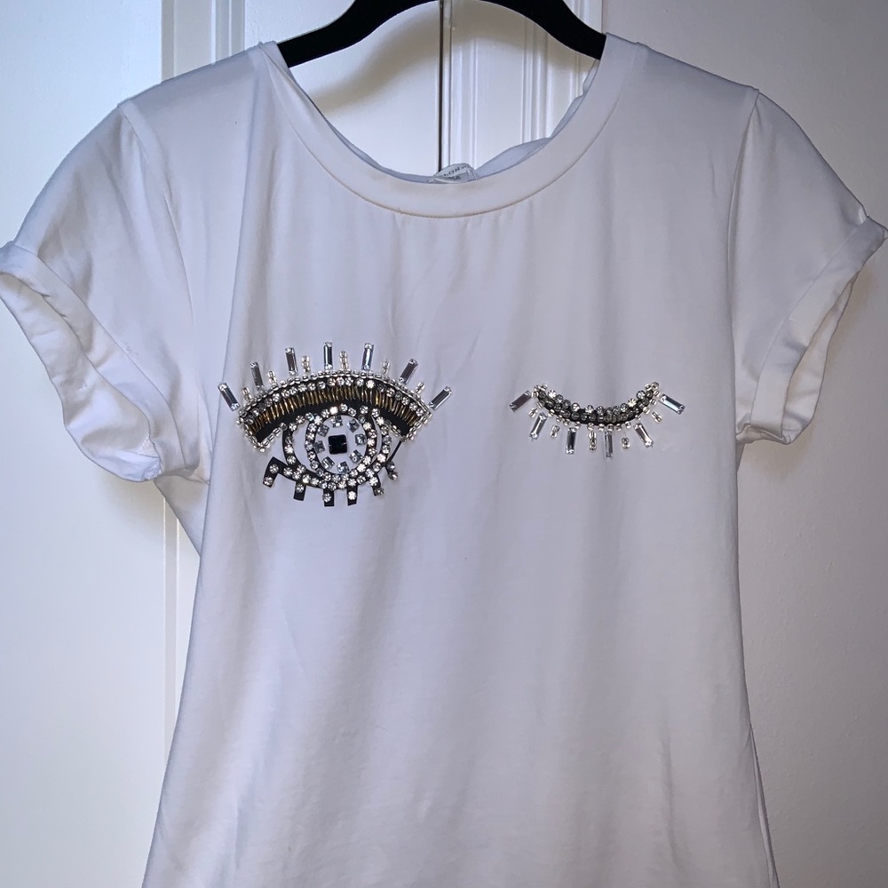 Form fitting t-shirt. NEVER WORN